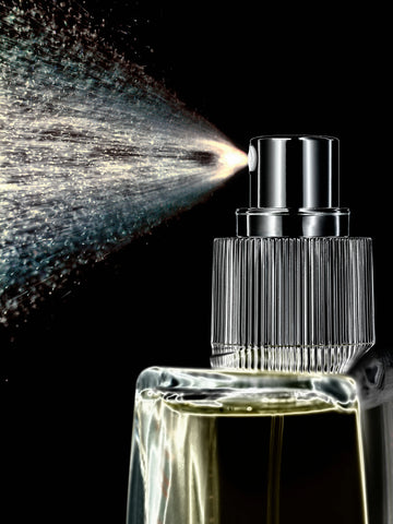 a pheromone fragrance atomizer spraying scent.