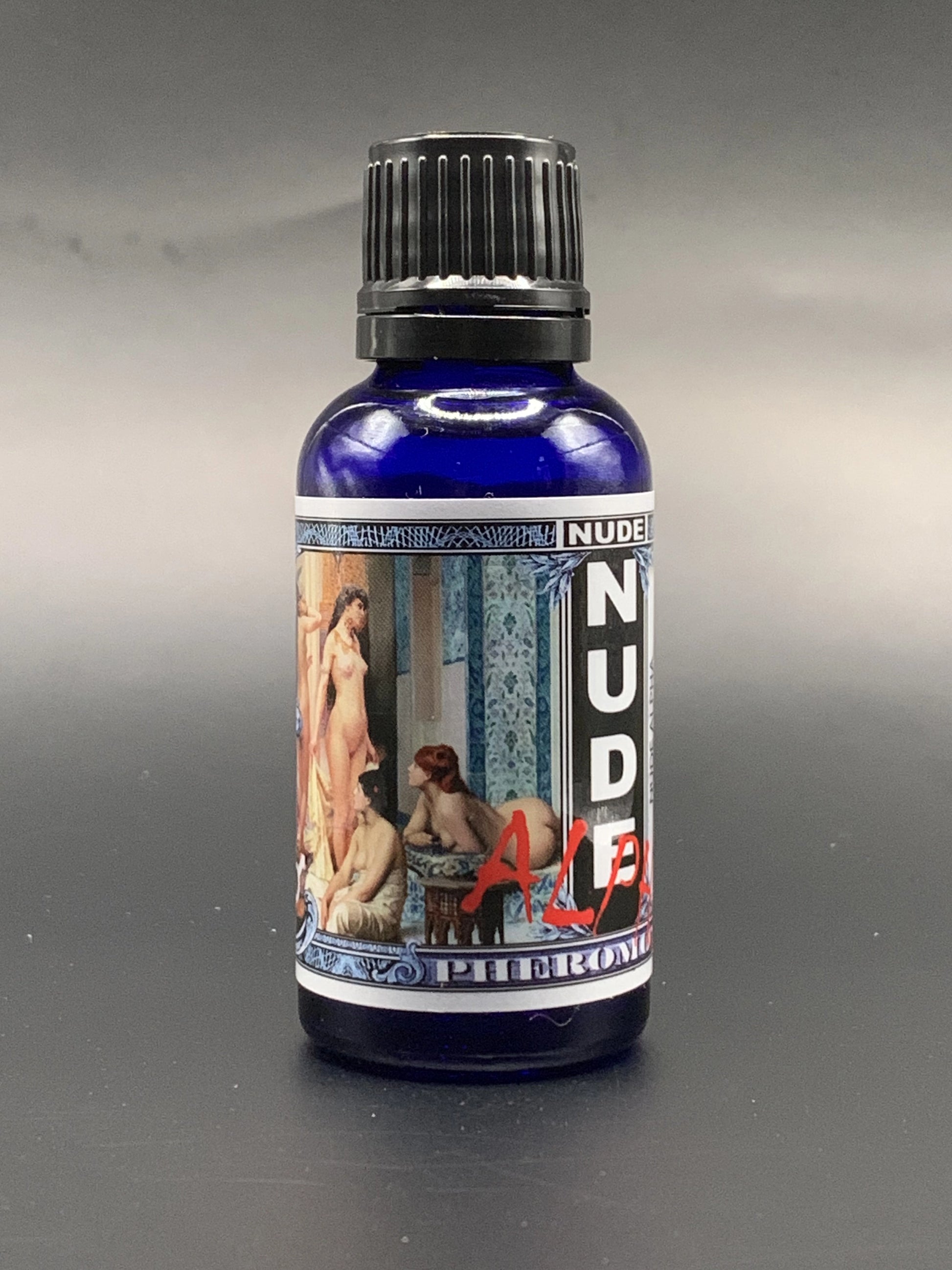 bottle of nude alpha pheromone oil for men to attract women. 