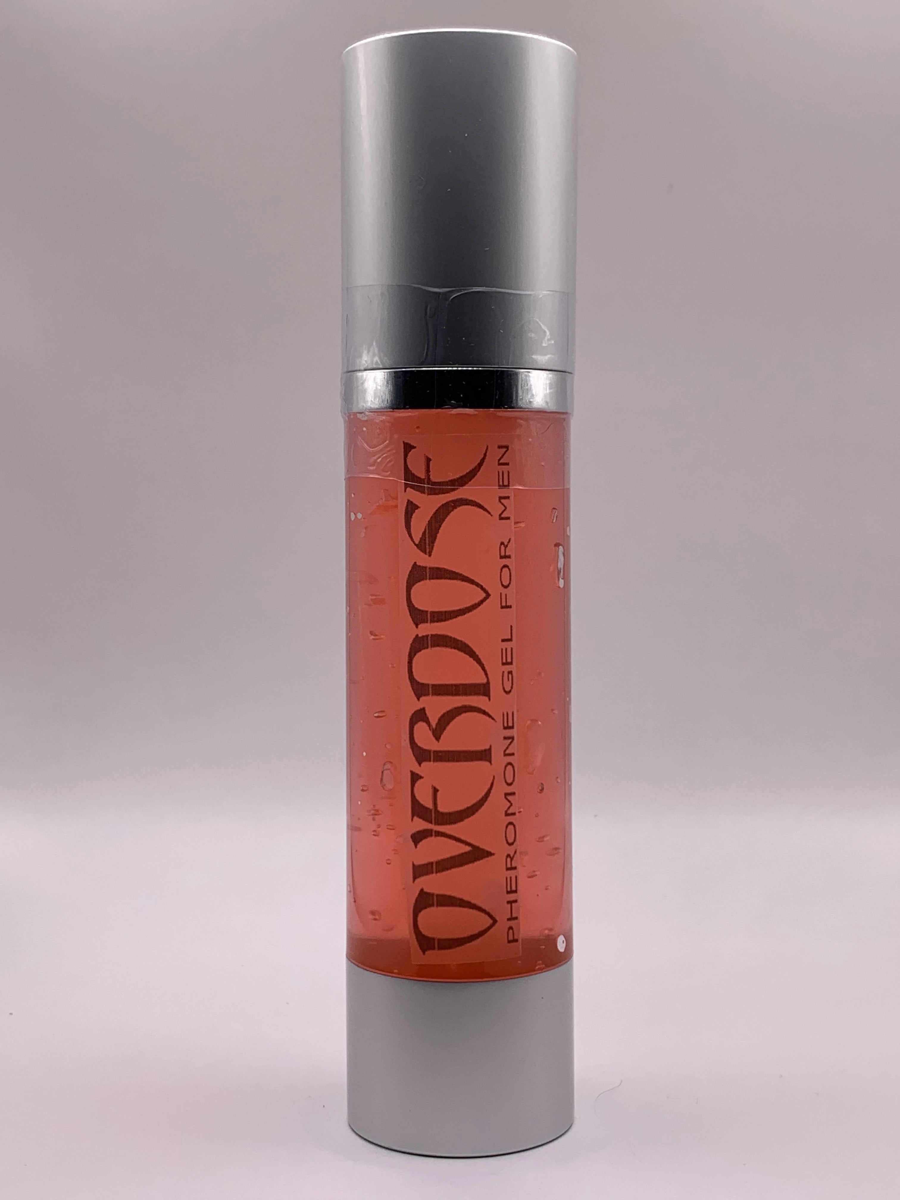 Bottle of red gel with label OVERDOSE PHEROMONE GEL printed on it