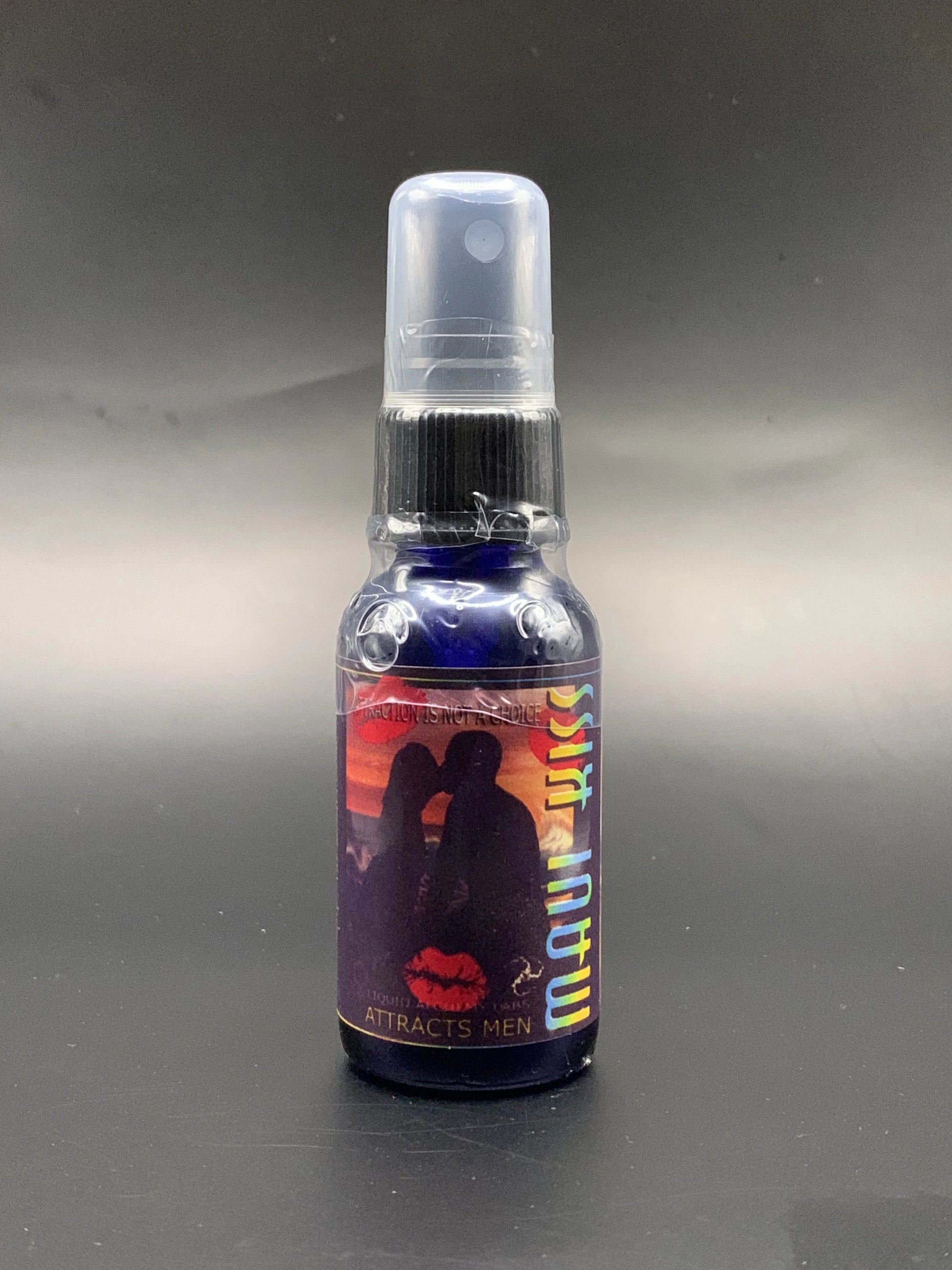 Blue bottle of pheromone perfume labeled maui kiss in 30ml
