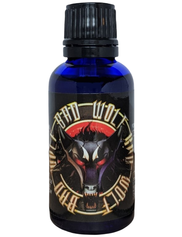 Bad Wolf Pheromone Oil blue bottle with packaging of artistic picture of wolf and a blue cap.