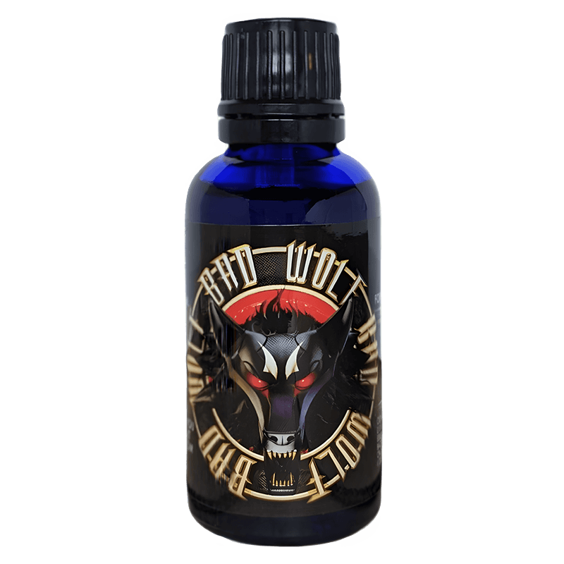 Bad Wolf Pheromone Oil by Liquid Alchemy Labs in a blue bottle with a fierce wolf design on the label, part of the Royal Pheromones line, designed for a bold and alpha presence; ideal for those seeking Pheromone Perfumes, Pheromone Oil, or Pheromone Colognes.
