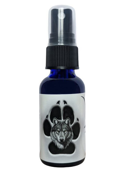 A dark blue spray bottle featuring a wolf's face inside a paw print.